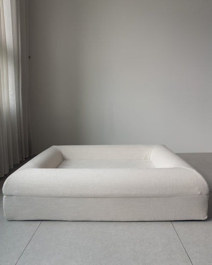 The KINNE Bed in Oat from the front